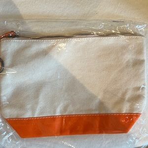 This listing is for 10 cosmetic bags (4 orange, 4 grey, and 2 navy)